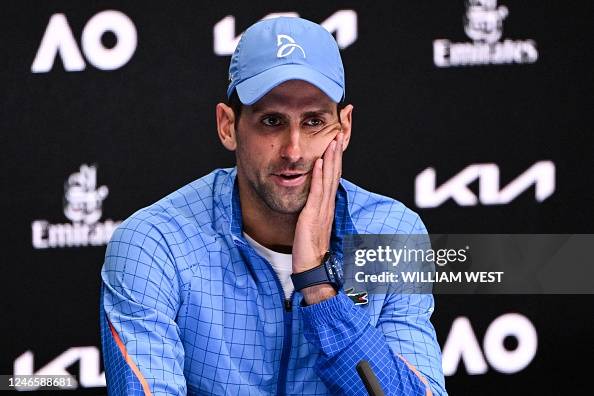 Serbia's Novak Djokovic gives a press conference after his victory ...