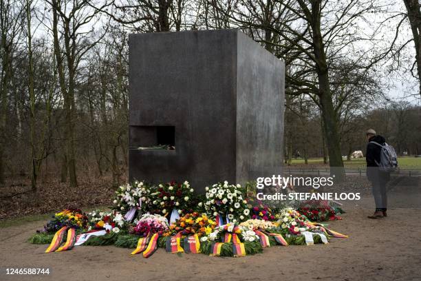 Wreaths have been placed in front of the Memorial to Homosexuals Persecuted Under Nazism at the Tiergarten in Berlin, Germany on January 27 on...