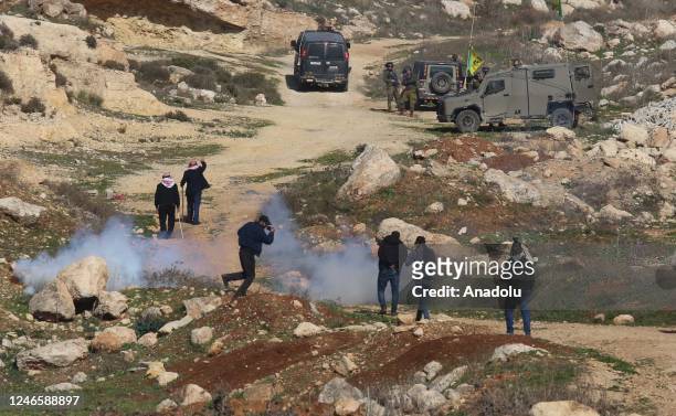 Israeli Forces intervene in demonstrators with tear gas as people gather to protest against construction of Jewish settlements in Nablus, West Bank...