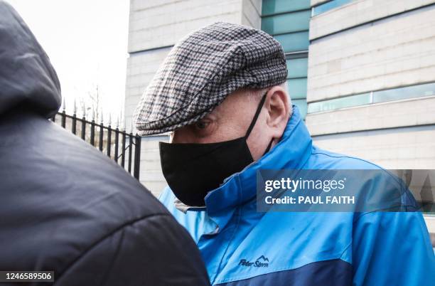 Britain's former soldier David Holden leaves at the Belfast Laganside court, in Belfast, on January 27, 2023 after his sentencing hearing for the...