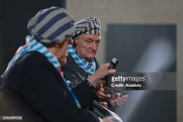 Survivors are seen inside the Sauna building at the former Auschwitz II-Birkenau camp during the main commemoration event, in Oswiecim, Poland, on...