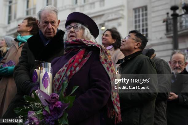 People gather at Piccadilly Circus to commemorate victims of the Holocaust on January 27, 2023 in London, England. Holocaust Memorial Day, held...