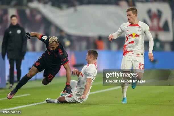 Eric Maxim Choupo-Moting of Bayern Muenchen, Willi Orban of RB Leipzig and Marcel Halstenberg of RB Leipzig battle for the ball during the Bundesliga...