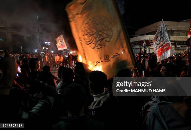 Palestinians celebrate in Gaza City on January 27 following a shooting attack by a Palestinian gunman outside an east Jerusalem synagogue.