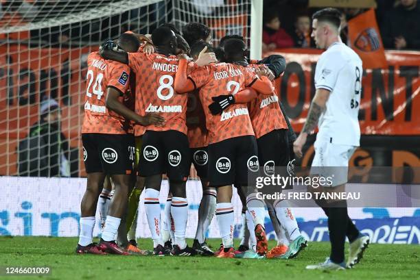 Lorient's players celebrate winning the French L1 football match between Lorient and Rennes at the Moustoir Stadium in Lorient on January 27, 2023.
