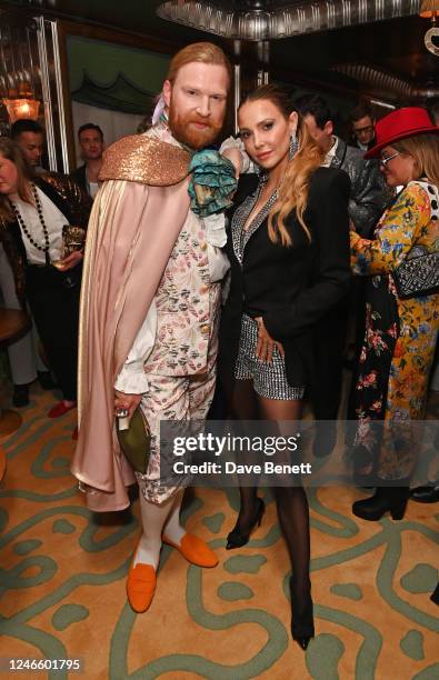 Henry Conway and Sophie Hermann attend Henry Conway 40th birthday party in Vesper Bar at The Dorchester on January 27, 2023 in London, England.