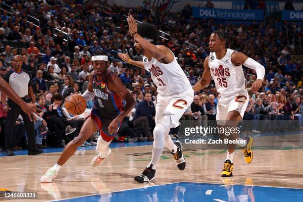 Shai Gilgeous-Alexander of the Oklahoma City Thunder dribbles the ball during the game against the Cleveland Cavaliers on January 27, 2023 at Paycom...