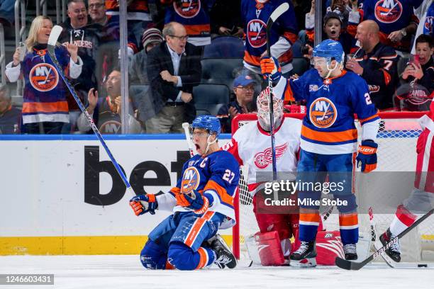Anders Lee of the New York Islanders celebrates after scoring a goal past Magnus Hellberg of the Detroit Red Wings during the first period at UBS...