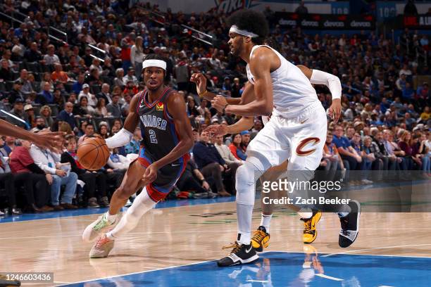 Shai Gilgeous-Alexander of the Oklahoma City Thunder dribbles the ball during the game against the Cleveland Cavaliers on January 27, 2023 at Paycom...