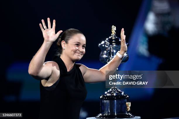 Retired former world number one Australian tennis player Ashleigh Barty gestures after placing the Daphne Akhurst Memorial Cup ahead of the womens...