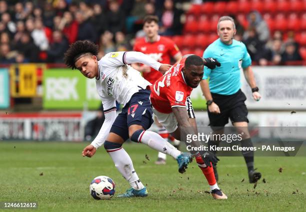 Bolton Wanderers' Shola Shoretire and Charlton Athletic's Corey Blackett-Taylor battle for the ball during the Sky Bet League One match at The...
