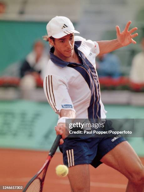 Mariano Zabaleta of Argentina returns the ball during the French Open at Stade Roland Garros in Paris, France, circa May 1998.