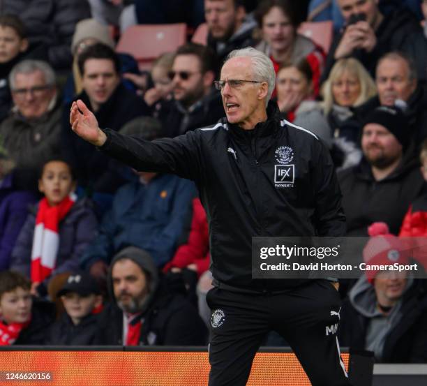 Blackpool head coach Mick McCarthy shouts instructions to his team from the technical area during The Emirates FA Cup Fourth Round match between...