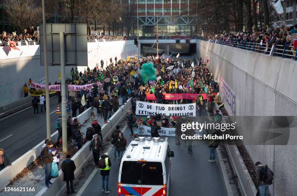 Extinction Rebellion activists block the A12 motorway on January 28, 2023 in The Hague, Netherlands. On January 28, 2023 in The Hague, Netherlands....