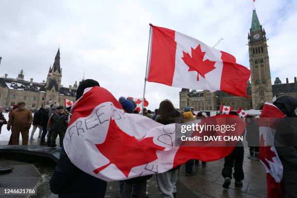 Freedom Convoy protesters gather on Parliament Hill for the first anniversary of the Covid-19 truck convoy protest, in Ottawa, Ontario, Canada, on...