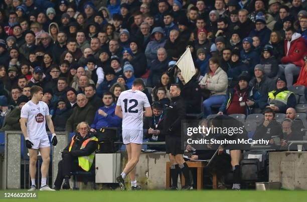 Dublin , Ireland - 28 January 2023; Paul Cribbin of Kildare leaves the pitch during a second half substitution as linesman David Gough hold his flag...