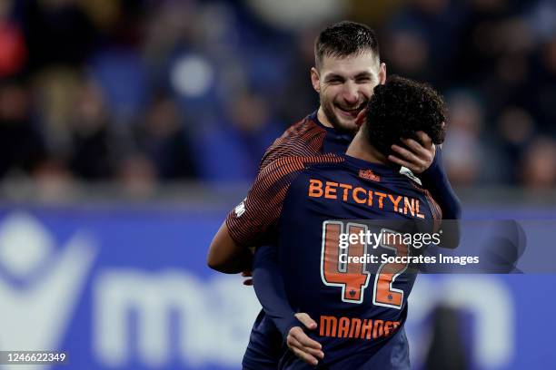 Million Manhoef of Vitesse celebrates 1-3 with Matus Bero of Vitesse during the Dutch Eredivisie match between SC Heerenveen v Vitesse at the Abe...