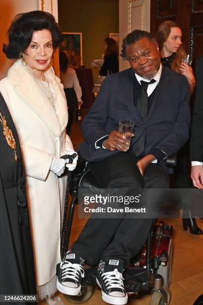 Bianca Jagger and Yinka Shonibare attend the "Art Without Borders" charity auction hosted by the Natalia Cola Foundation to raise funds for the...