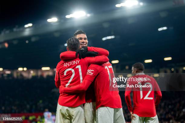 Casemiro of Manchester United celebrates with Antony & Fred during the Emirates FA Cup Fourth Round match between Manchester United and Reading at...