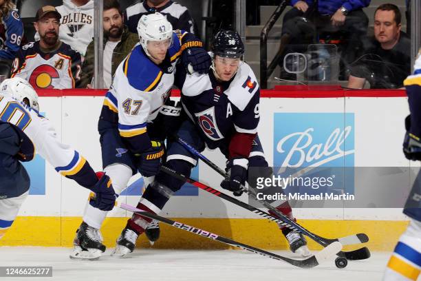 Torey Krug of the St. Louis Blues skates against Mikko Rantanen of the Colorado Avalanche at Ball Arena on January 28, 2023 in Denver, Colorado.
