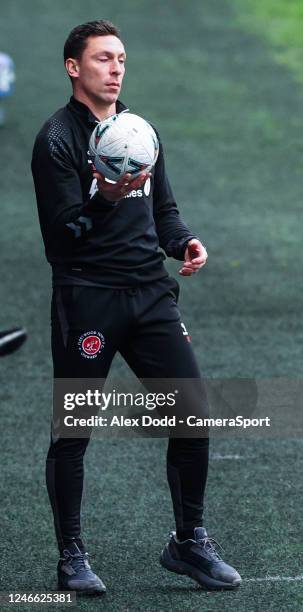 Fleetwood Town head coach Scott Brown catches the ball during the Emirates FA Cup Fourth Round match between Sheffield Wednesday and Fleetwood Town...