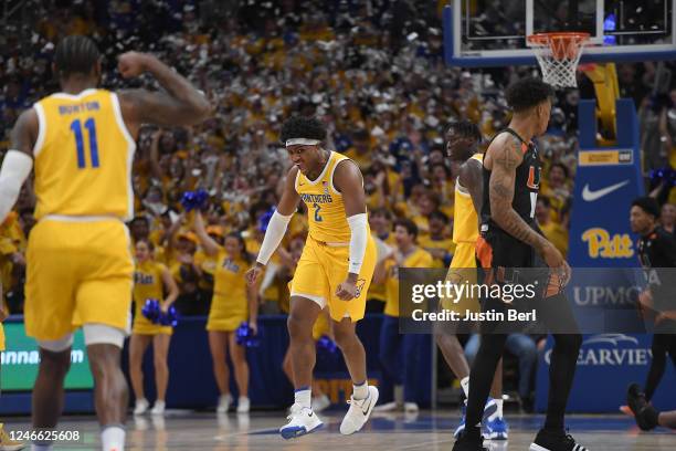 Blake Hinson of the Pittsburgh Panthers reacts after a basket in the first half during the game against the Miami Hurricanes at Petersen Events...