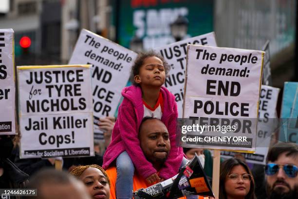 Protesters gather during a rally against the fatal police assault of Tyre Nichols, in Atlanta, Georgia, on January 28, 2023. - The city of Memphis on...