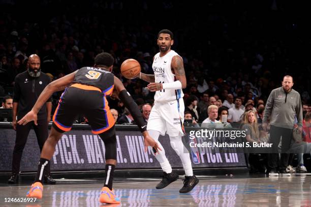 Kyrie Irving of the Brooklyn Netson dribbles the ball during the game against the New York Knicks January 28, 2023 at Barclays Center in Brooklyn,...