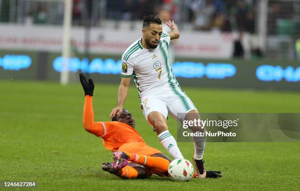 Algeria's Abderrahmane Meziane vies with Cote d'Ivoire's Souleymane Coulibaly during the quarterfinal match of the 7th African Nations Championship...