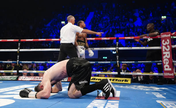 Artur Beterbiev celebrates defeating Anthony Yarde after his corner throw the towel in during their WBC, IBF and WBO light-heavyweight contest at the...