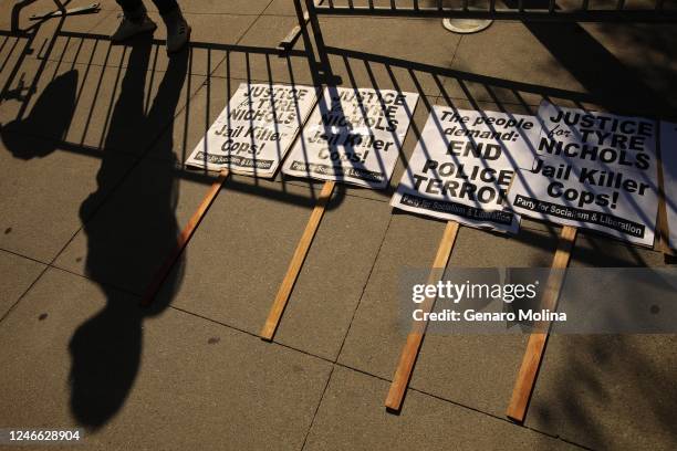 Shadow is cast over picket signs where over 50 protesters make their voices heard a day after the release of a video of Tyre Nichols being beaten by...