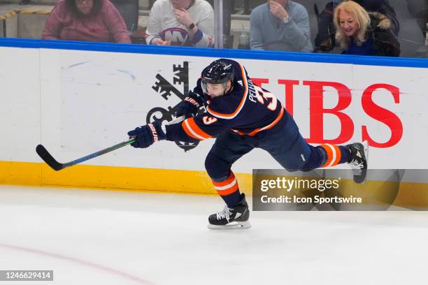 New York Islanders Defenseman Adam Pelech takes a shot on goal during the first period of the National Hockey League game between the Las Vegas...