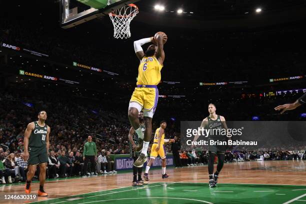 LeBron James of the Los Angeles Lakers dunks the ball during the game against the Boston Celtics on January 28, 2023 at the TD Garden in Boston,...
