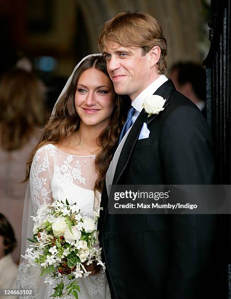 Mary-Clare Winwood and Ben Elliot leave the church of St. Peter and St. Paul, Northleach after their wedding on September 10, 2011 in Cheltenham,...