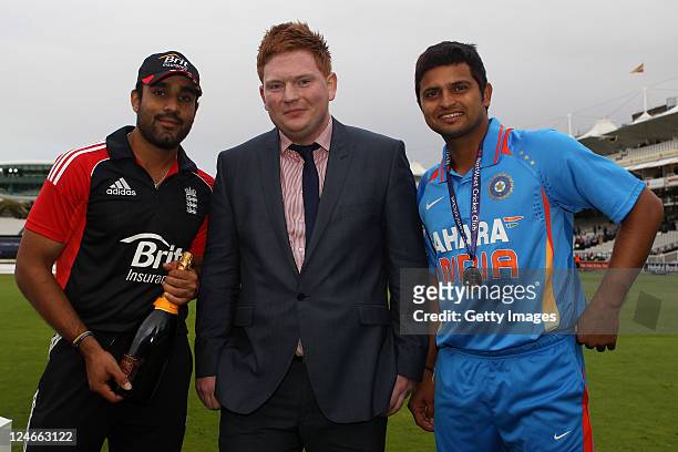 Ravi Bopara of England, a competion winner and Suresh Raina of India pose for a photograph after the 4th Natwest One Day International match between...