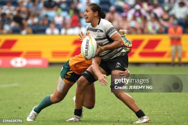 Talei Wilson of Fiji looks to make a pass in the match between Fiji and Australia during the World Rugby Sevens series match at the Allianz Stadium...