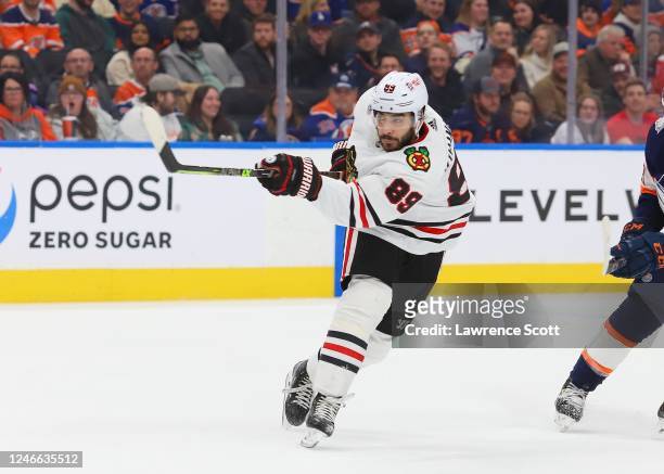Andreas Athanasiou of the Chicago Black Hawks shoots the puck in the second period against the Edmonton Oilers on January 28, 2023 at Rogers Place in...