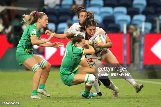 Ireland's Beibhinn Parsons tackles USA's Ilona Maher during the World Rugby Women's Sevens series match between Ireland and the United States at the...