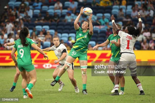 Ireland's Eve Higgins catches the ball during the World Rugby Women's Sevens series match between Ireland and the United States at the Allianz...
