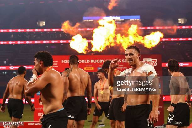 New Zealand's players pefrom the Haka as they celebrate winning the competition after the the end of the World Rugby Sevens series match against...
