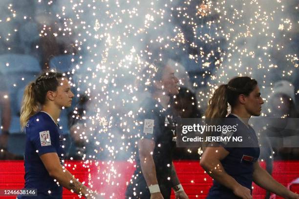 Players walk out for the World Rugby Women's Sevens series match between the New Zealand and France at the Allianz Stadium in Sydney on January 29,...