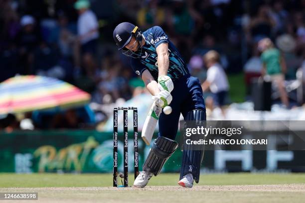 England's Jos Buttler hits a six during the second one day international cricket match between South Africa and England at Mangaung Oval in...