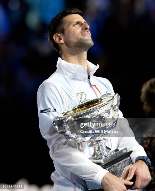 Novak Djokovic of Serbia poses with the Norman Brookes Challenge Cup after winning the Men's Singles Final match against Stefanos Tsitsipas of Greece...