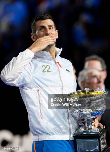 Novak Djokovic of Serbia poses with the Norman Brookes Challenge Cup after winning the Men's Singles Final match against Stefanos Tsitsipas of Greece...