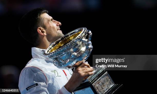 Novak Djokovic of Serbia poses with the Norman Brookes Challenge Cup after winning the Men's Singles Final match against Stefanos Tsitsipas of Greece...