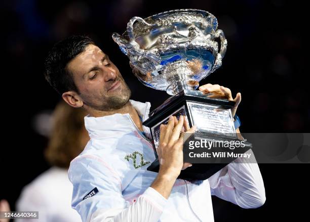 Novak Djokovic of Serbia poses with the Norman Brookes Challenge Cup after winning the Men's Singles Final match against Stefanos Tsitsipas of Greece...