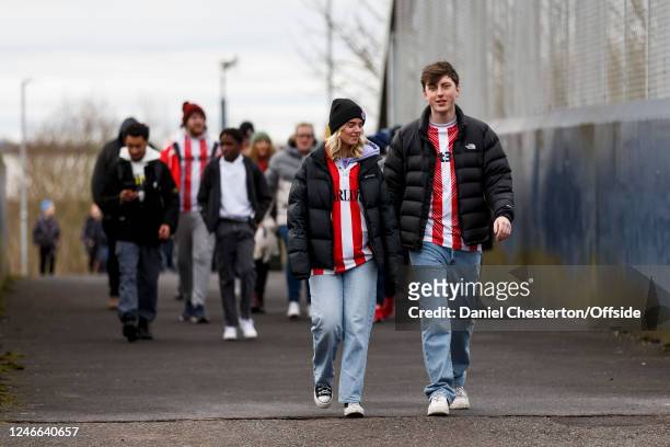Stoke City fans walk to the stadium before the FA Cup Fourth Round match between Stoke City and Stevenage at Bet365 Stadium on January 29, 2023 in...