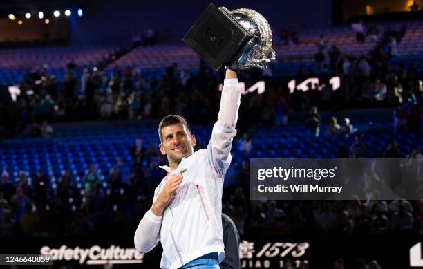 Novak Djokovic of Serbia poses with the Norman Brookes Challenge Cup after winning the Men's Singles Final match against Stefanos Tsitsipas of Greece...