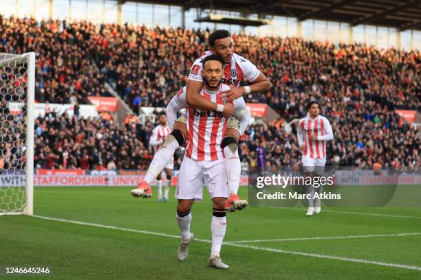 Lewis Baker of Stoke City celebrates scoring the 3rd goal from the penalty spot with Jacob Brown during the Emirates FA Cup Fourth Round between...
