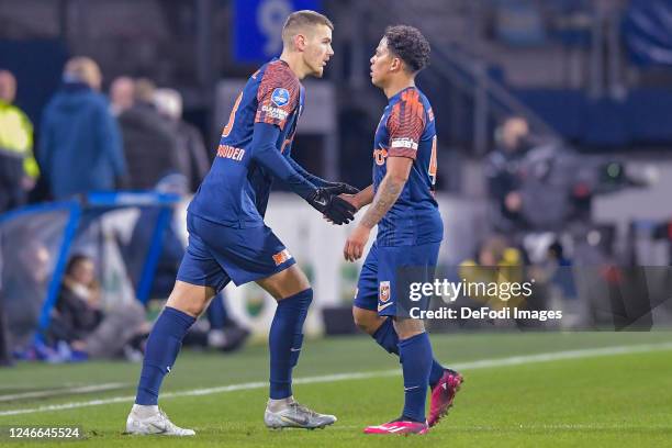 Simon van Duivenbooden of Vitesse Arnhem and Million Manhoef of Vitesse Arnhem substitutes during the Dutch Eredivisie match between sc Heerenveen...